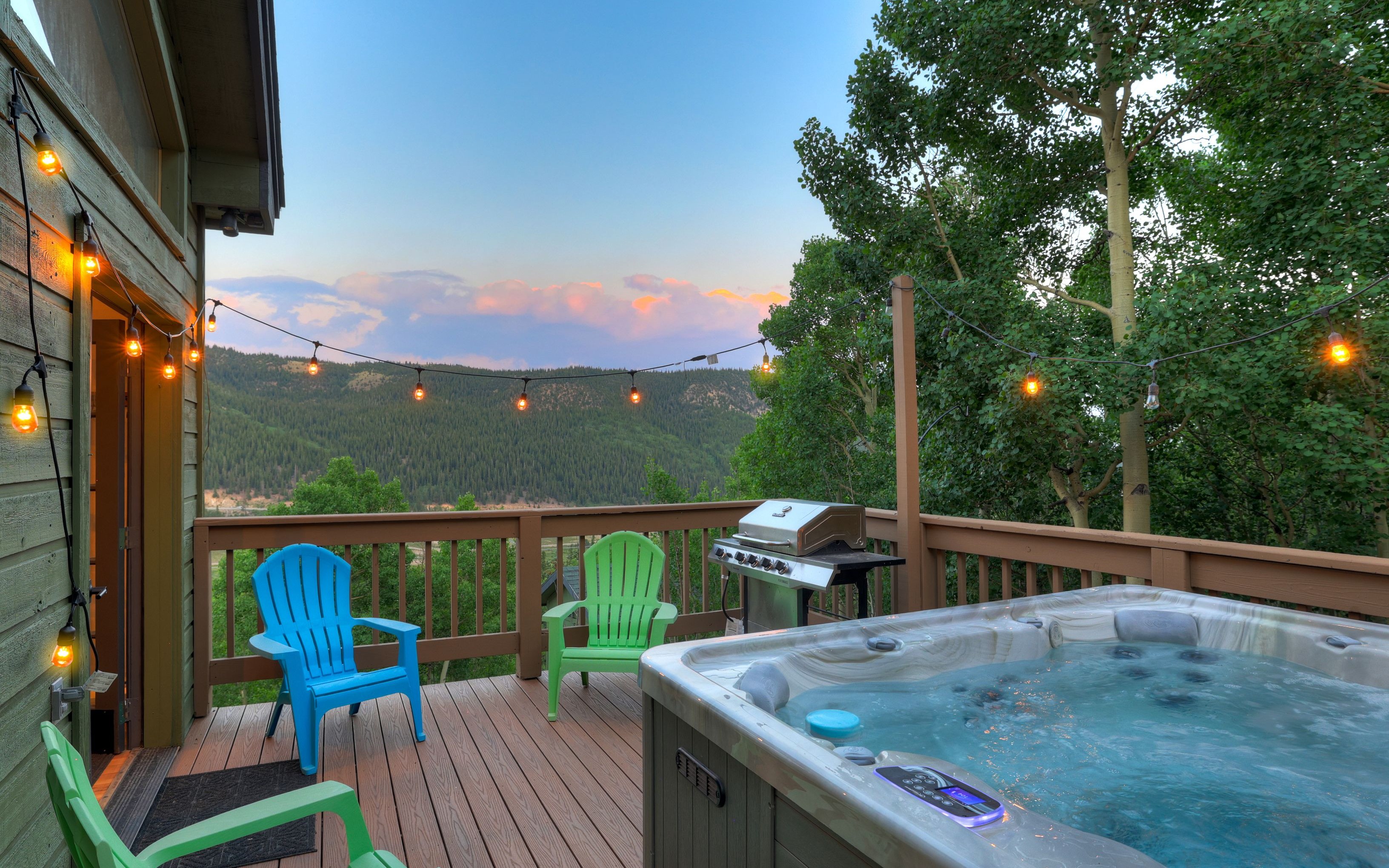 A luxury mountain home at dusk in Summit County, Colorado.