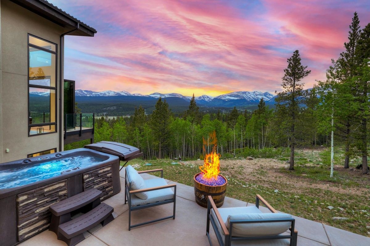A luxury mountain home at dusk in Summit County, Colorado.
