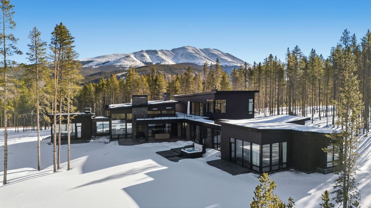 Aerial of the Peak 9 base and the Four O'Clock corridor toward downtown Breckenridge, Colorado